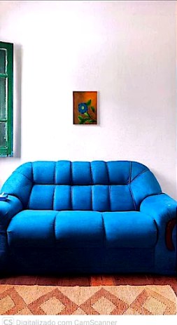 Sofá azul do espaço terapêutico